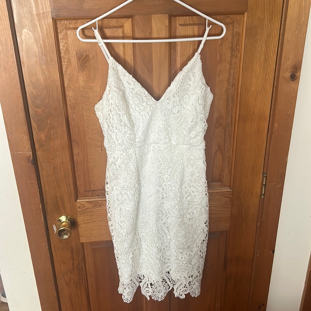 White lace midi dress. Perfect for anything bridal or beachy.